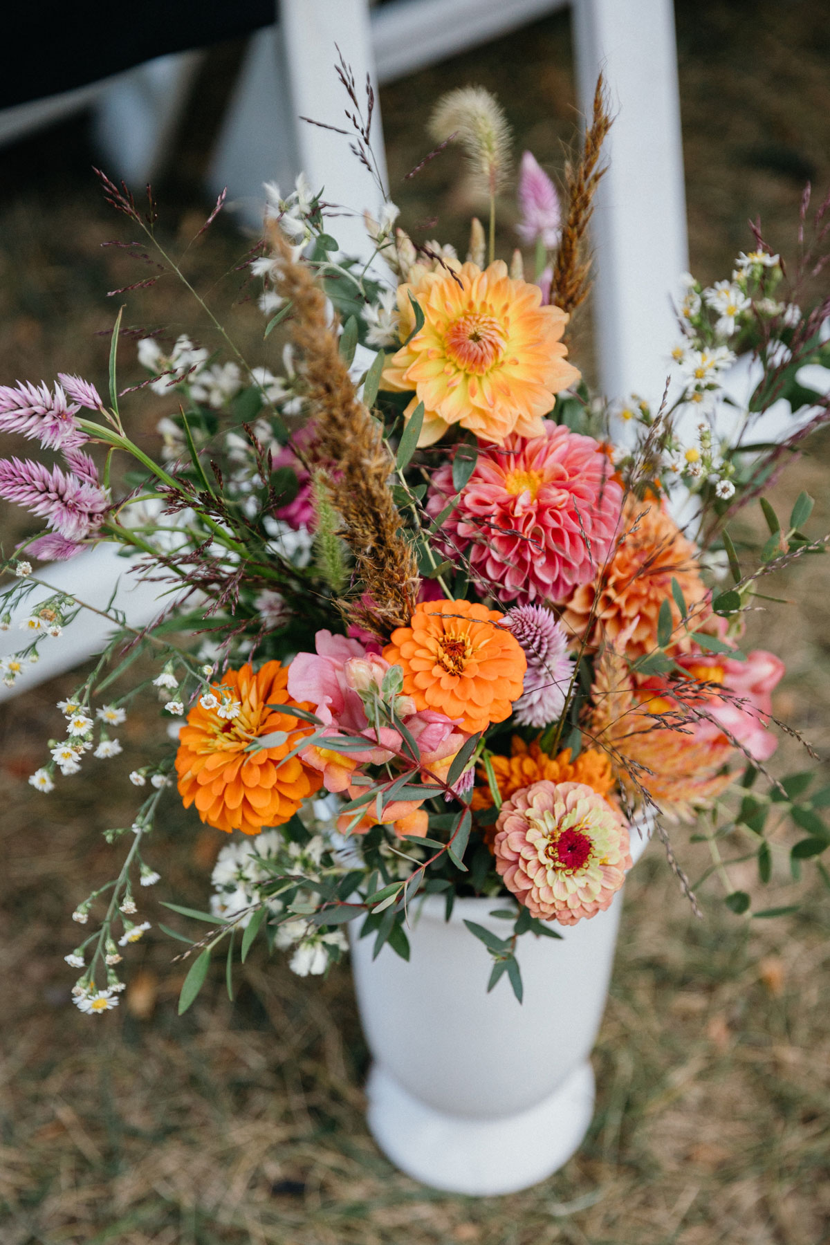 Vibrant and colorful ceremony florals.