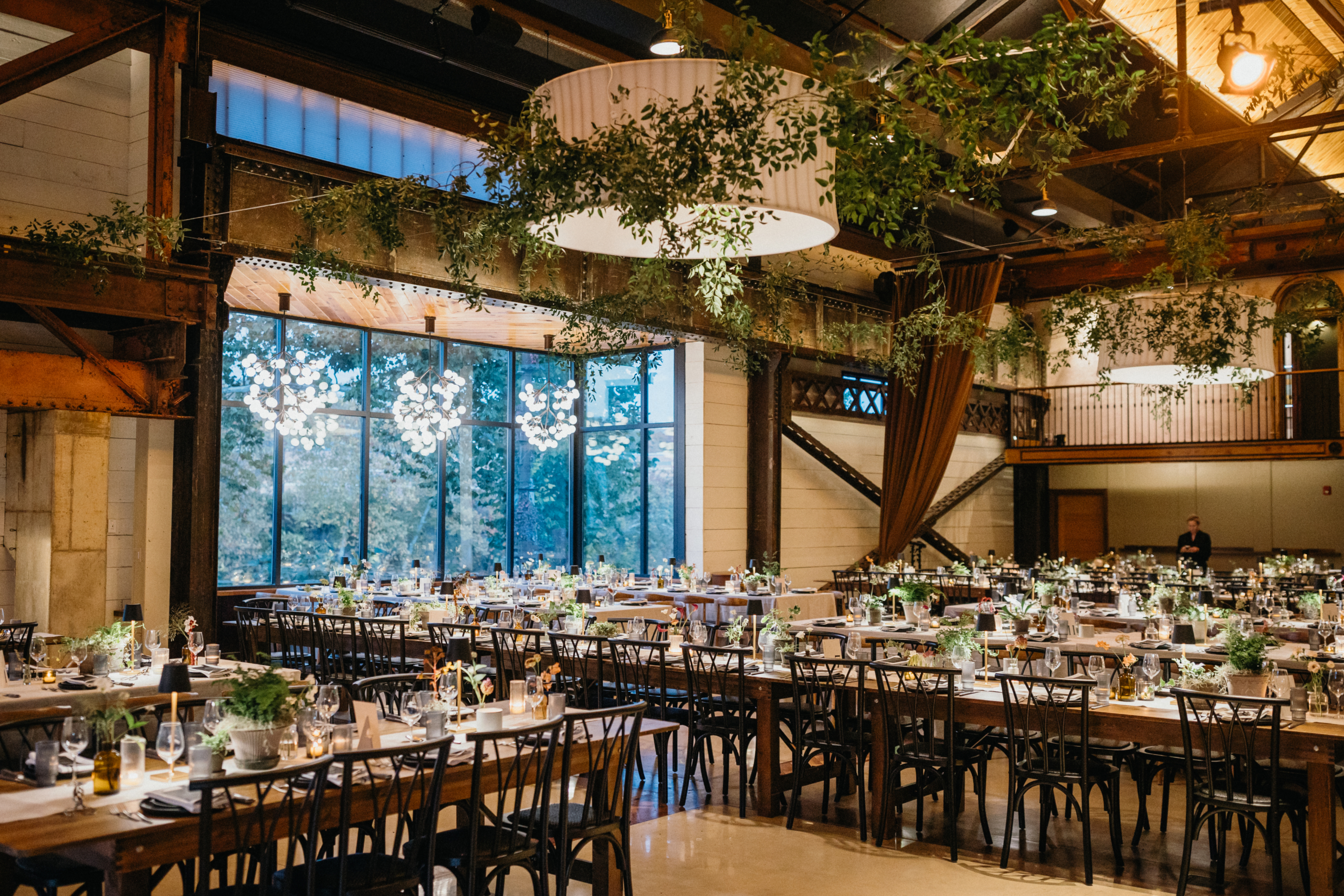 A cozy indoor wedding reception at The Pump House at Pencoyd which is a nontraditional wedding venue in Philly.