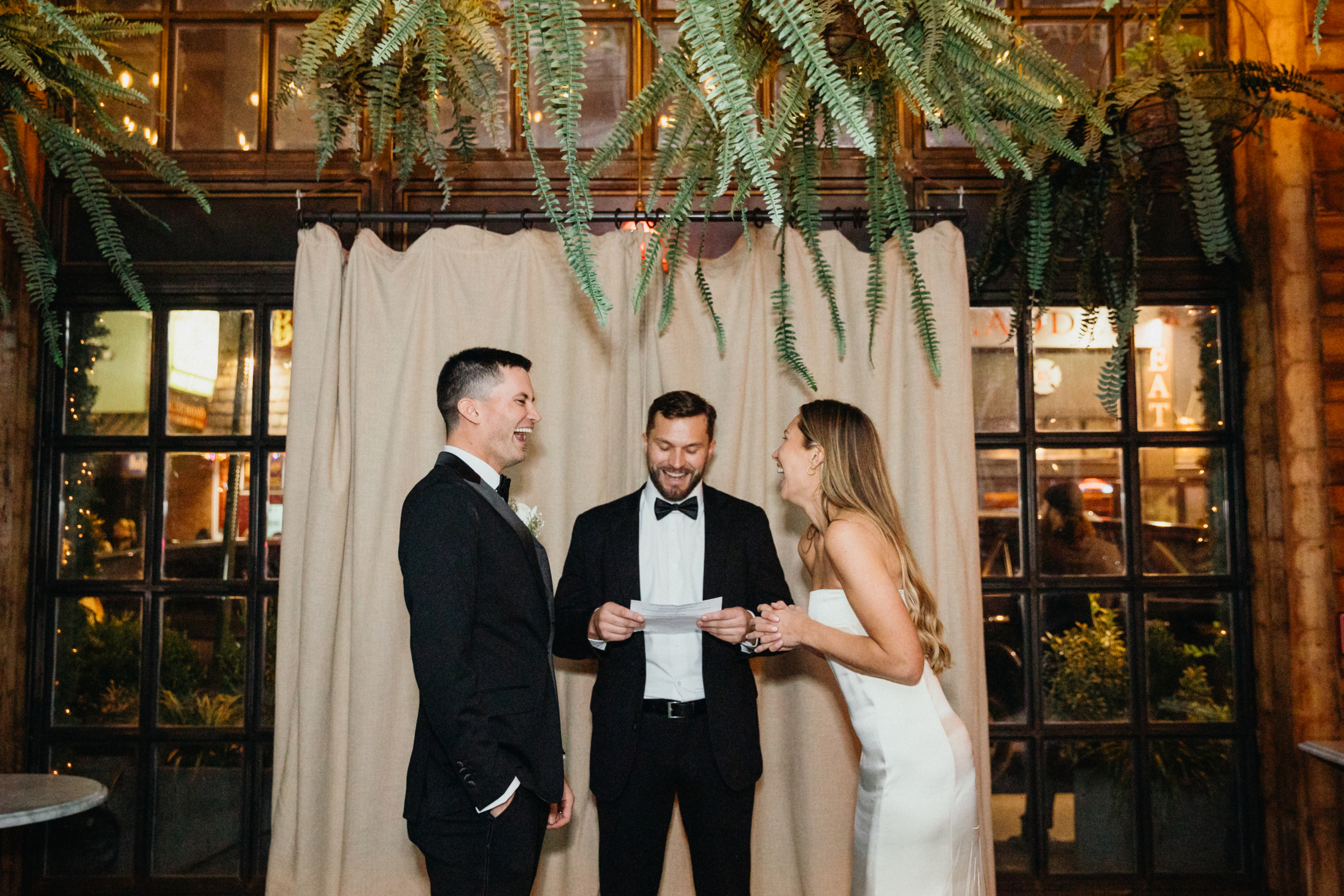 Indoor microwedding reception at Harp & Crown in Philadelphia, Pennsylvania. 