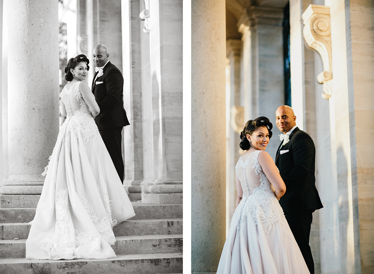 A candid moment between the newlyweds, framed by towering columns and sculptural details.