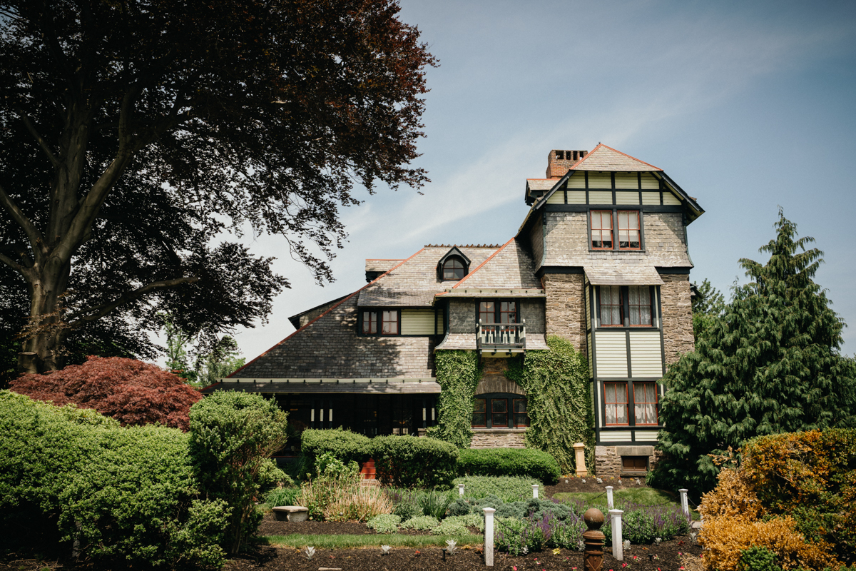 A charming historic mansion with vintage details and candlelit reception space.