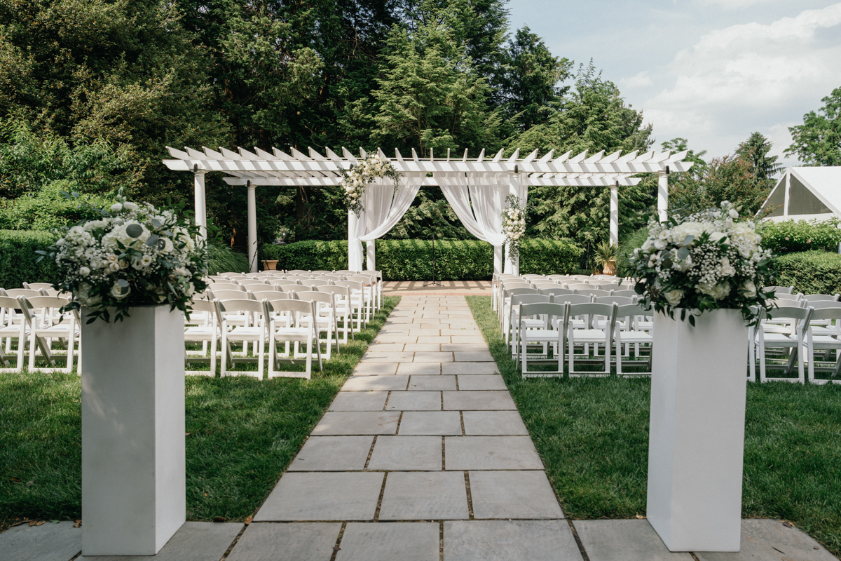 Estate wedding venue featuring historic courtyards, cobblestone paths, and ivy walls in Philadelphia, Pennsylvania