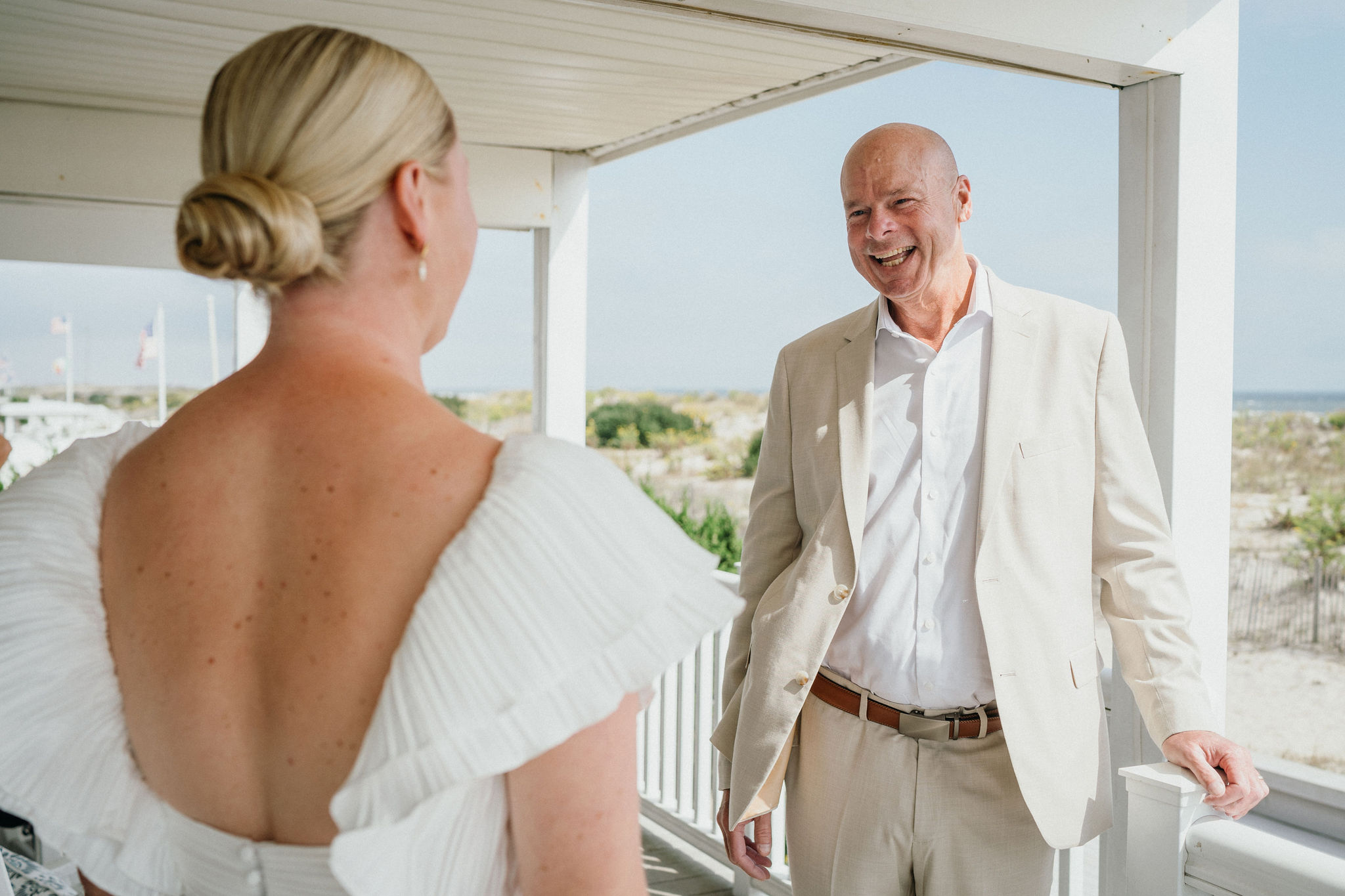 Bride and her father sharing an emotional moment.