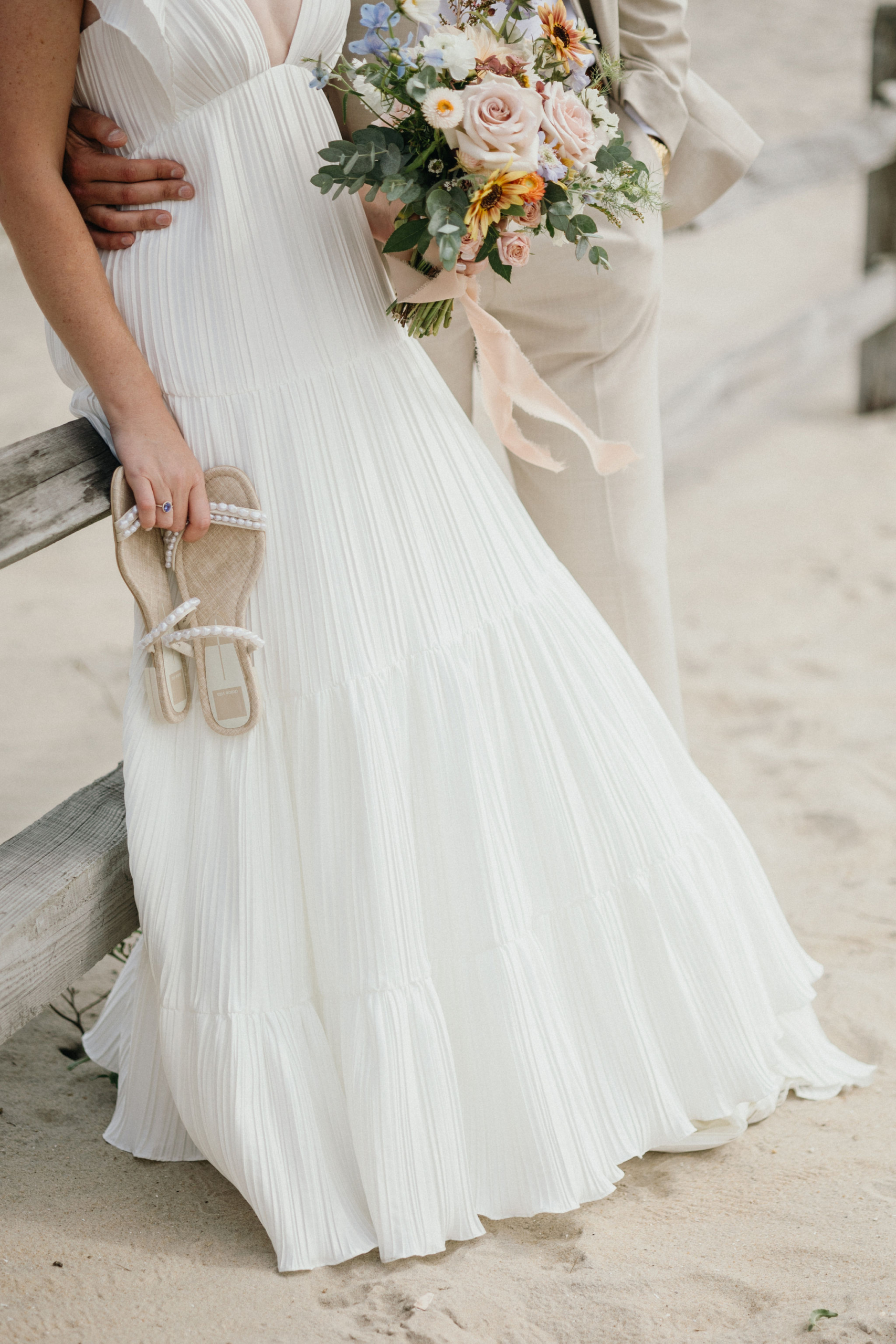 Guests gathered on the sand for a New Jersey beach wedding.