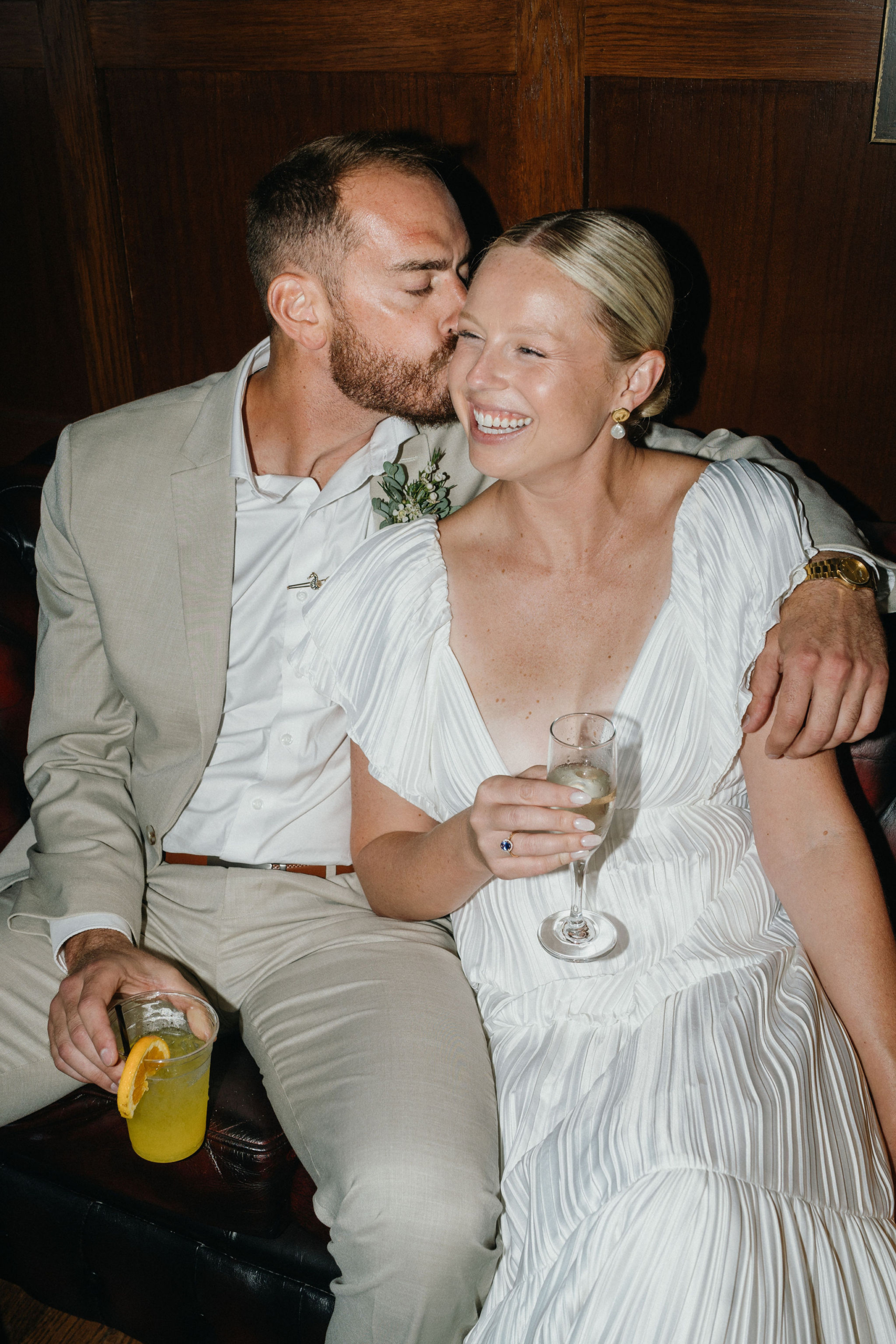 Direct flash photo of couple before their Deauville Inn wedding. 