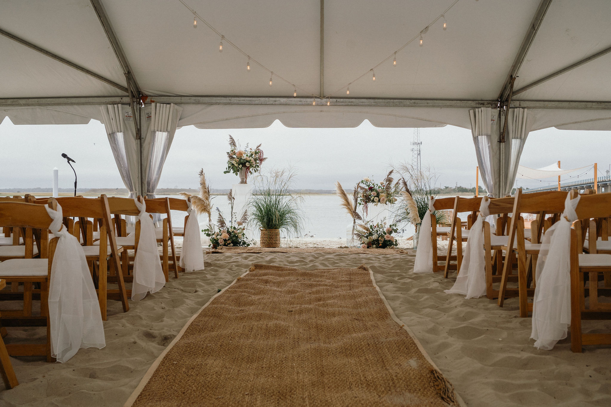 Soft, neutral tones complement the coastal setting at this Deauville Inn wedding.