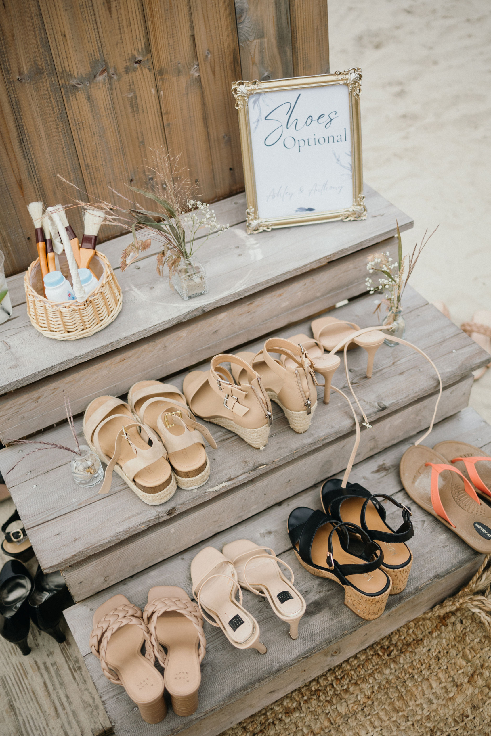 A simple barefoot ceremony by the shore at a Deauville Inn wedding.