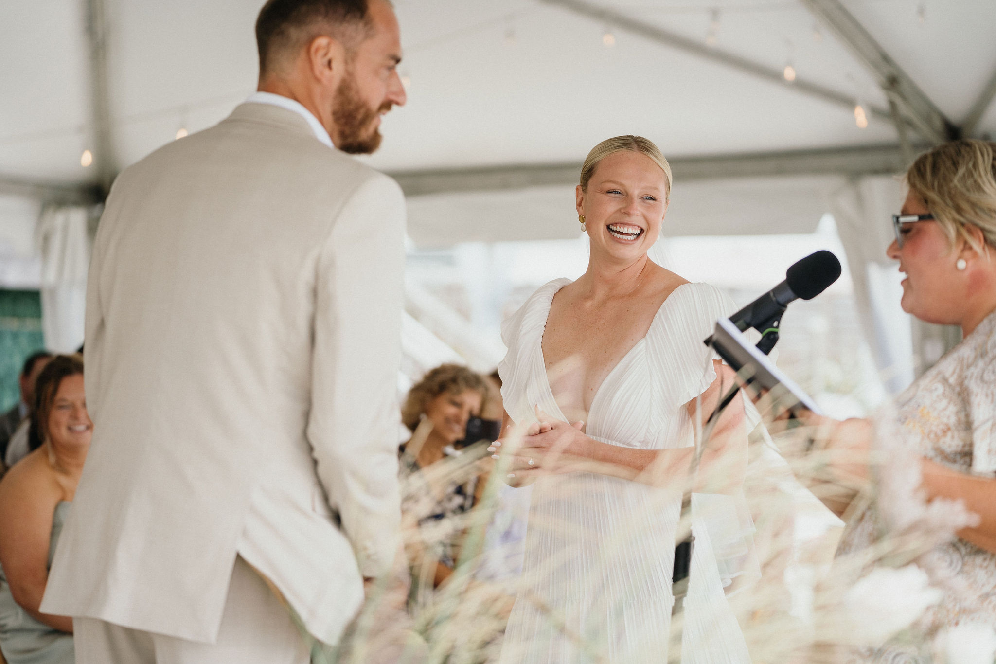 A quiet “I do” with sandy toes at Deauville Inn wedding. 