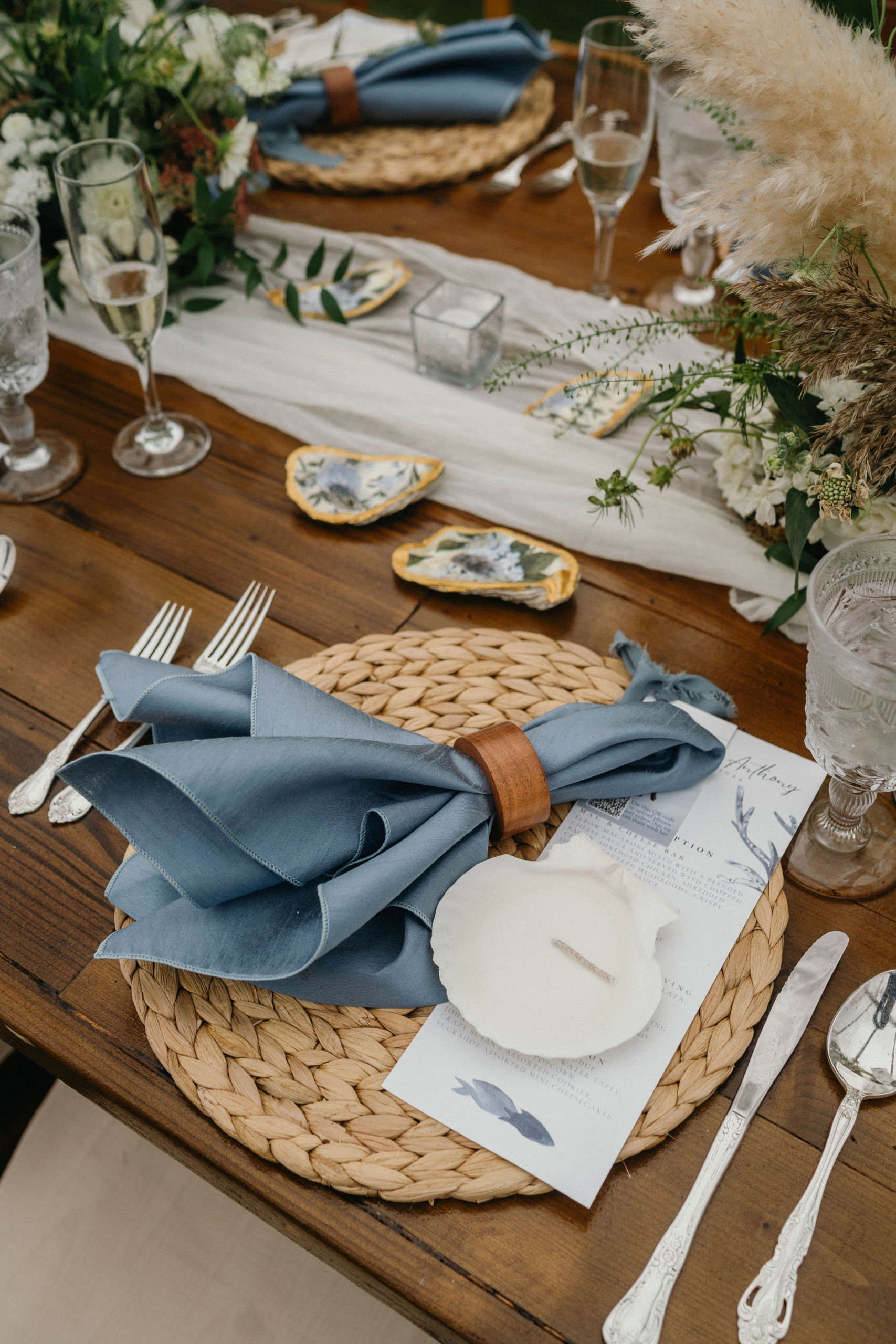 Elegant beach-inspired place settings with organic textures.