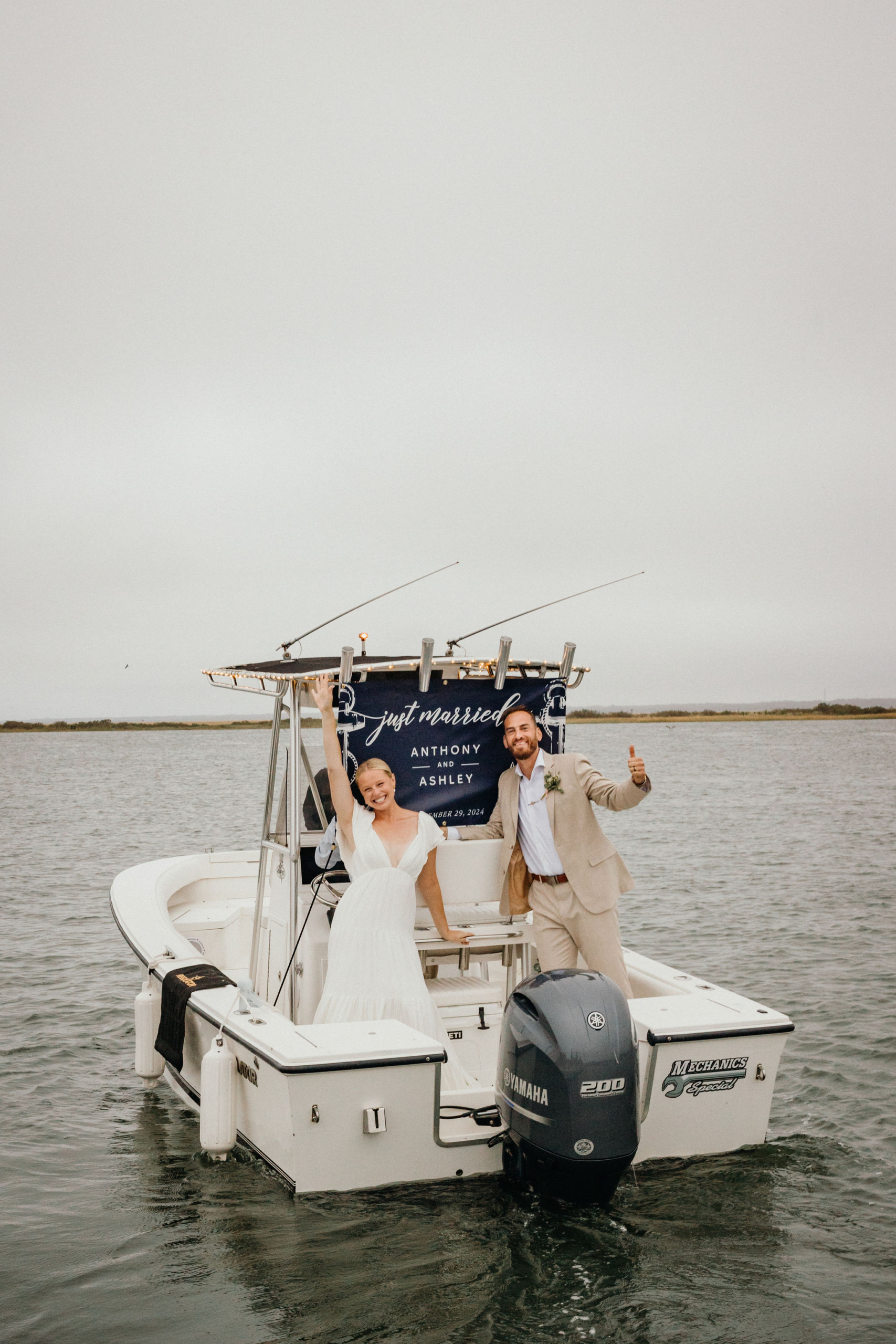 Just married, sailing past the Deauville Inn.