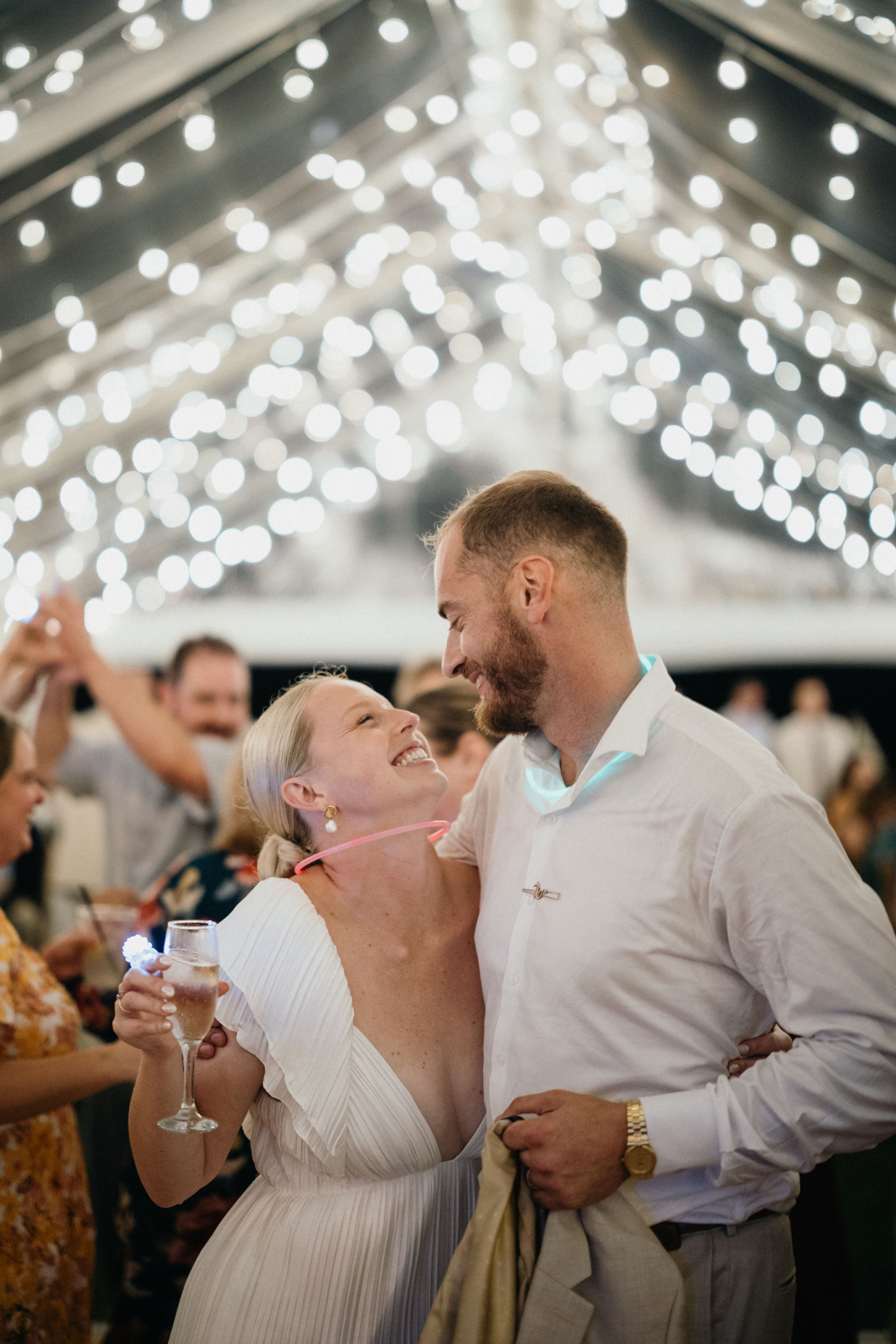 A joyful moment on the dance floor by the water at Deauville Inn wedding. 