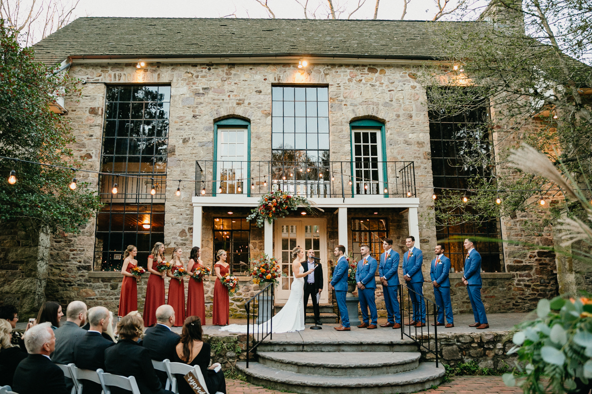 A historic venue with a dramatic ballroom and a romantic terrace for sunset vows.