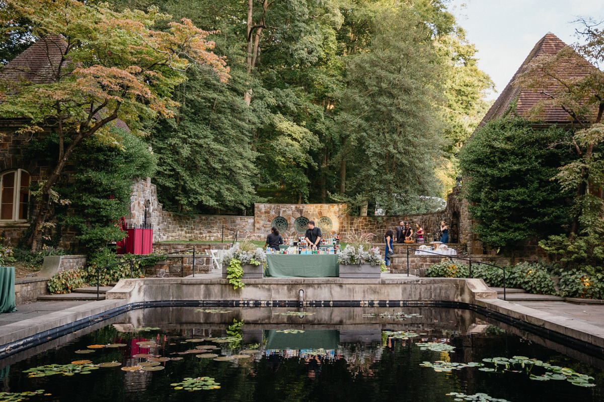 A historic Philadelphia estate with a dramatic staircase and candlelit reception hall.