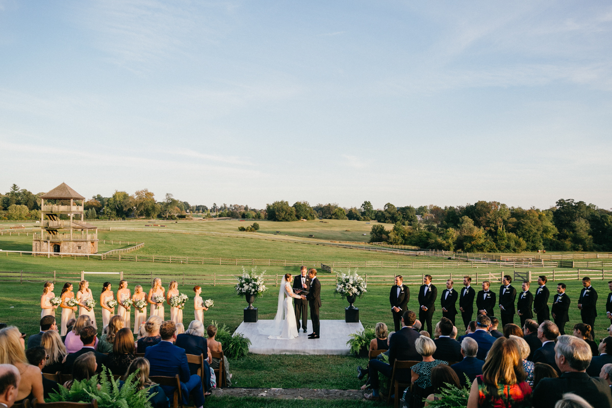 Estate wedding venue with sweeping views, grand fireplaces, and opulent décor near Philadelphia.