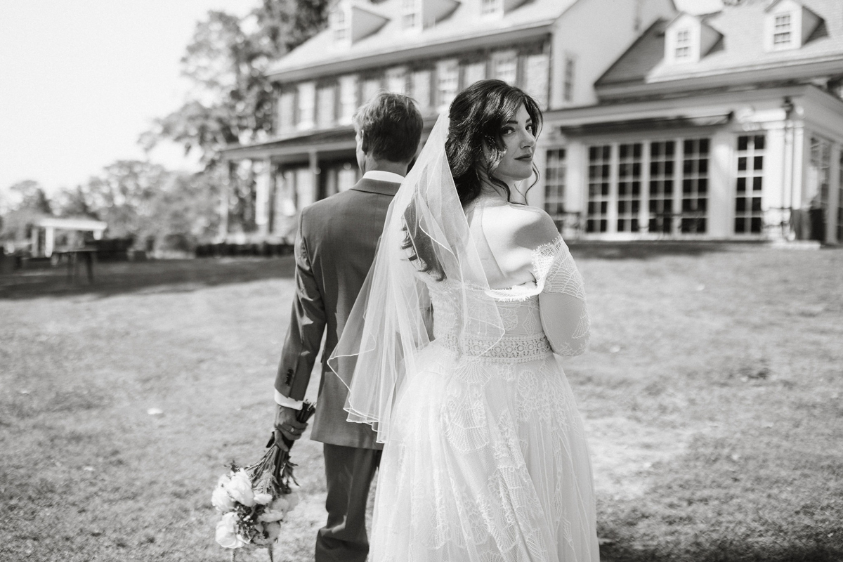 A dreamy black-and-white portrait of the newlyweds, lost in the moment.