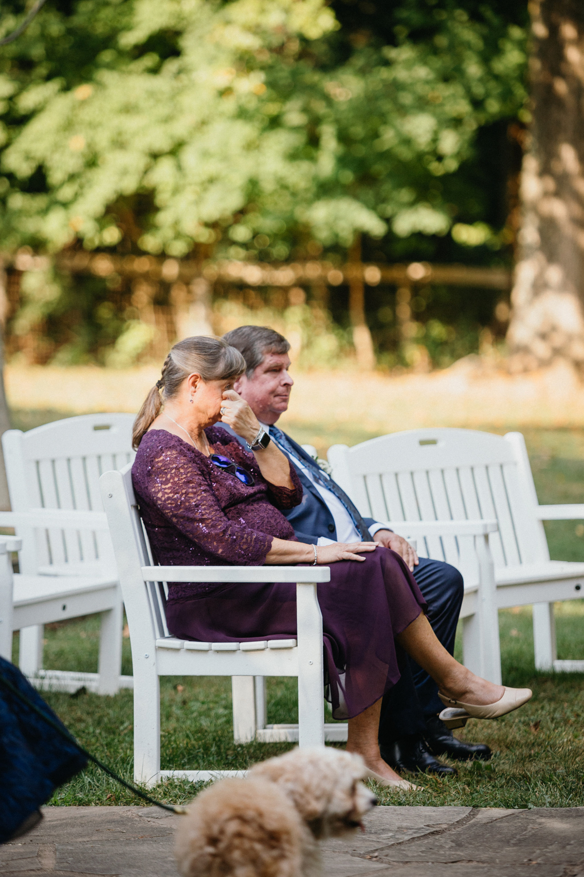 Quiet moments between the newlyweds in the vineyard.