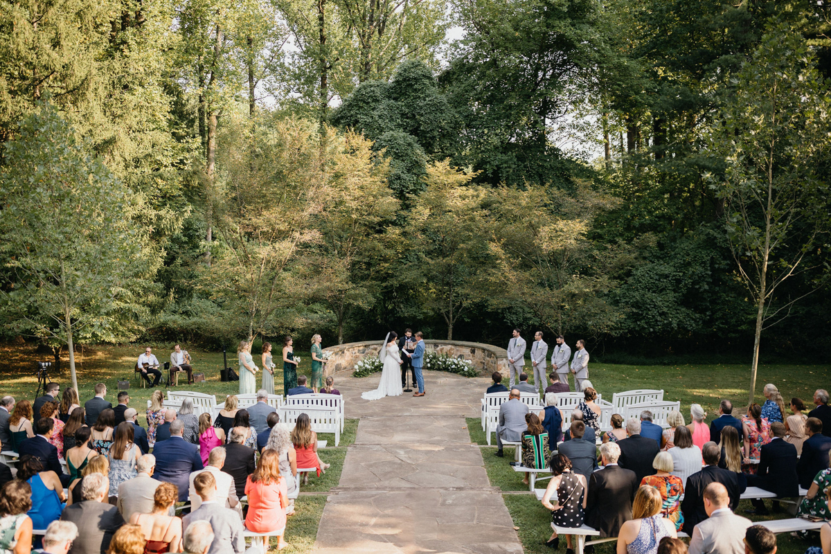 A serene outdoor ceremony among the vines at Grace Winery.