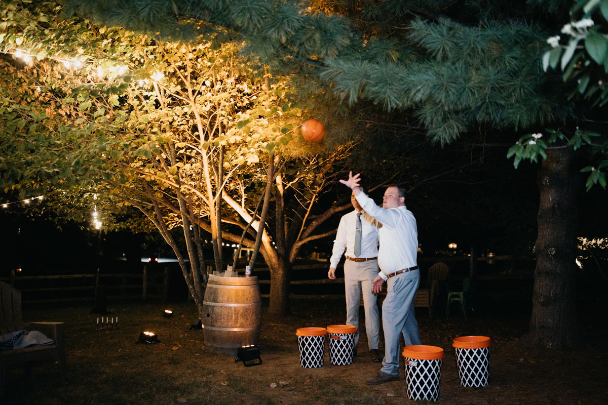 Guests mingling over cocktails at an outdoor wedding venue near Philadelphia.