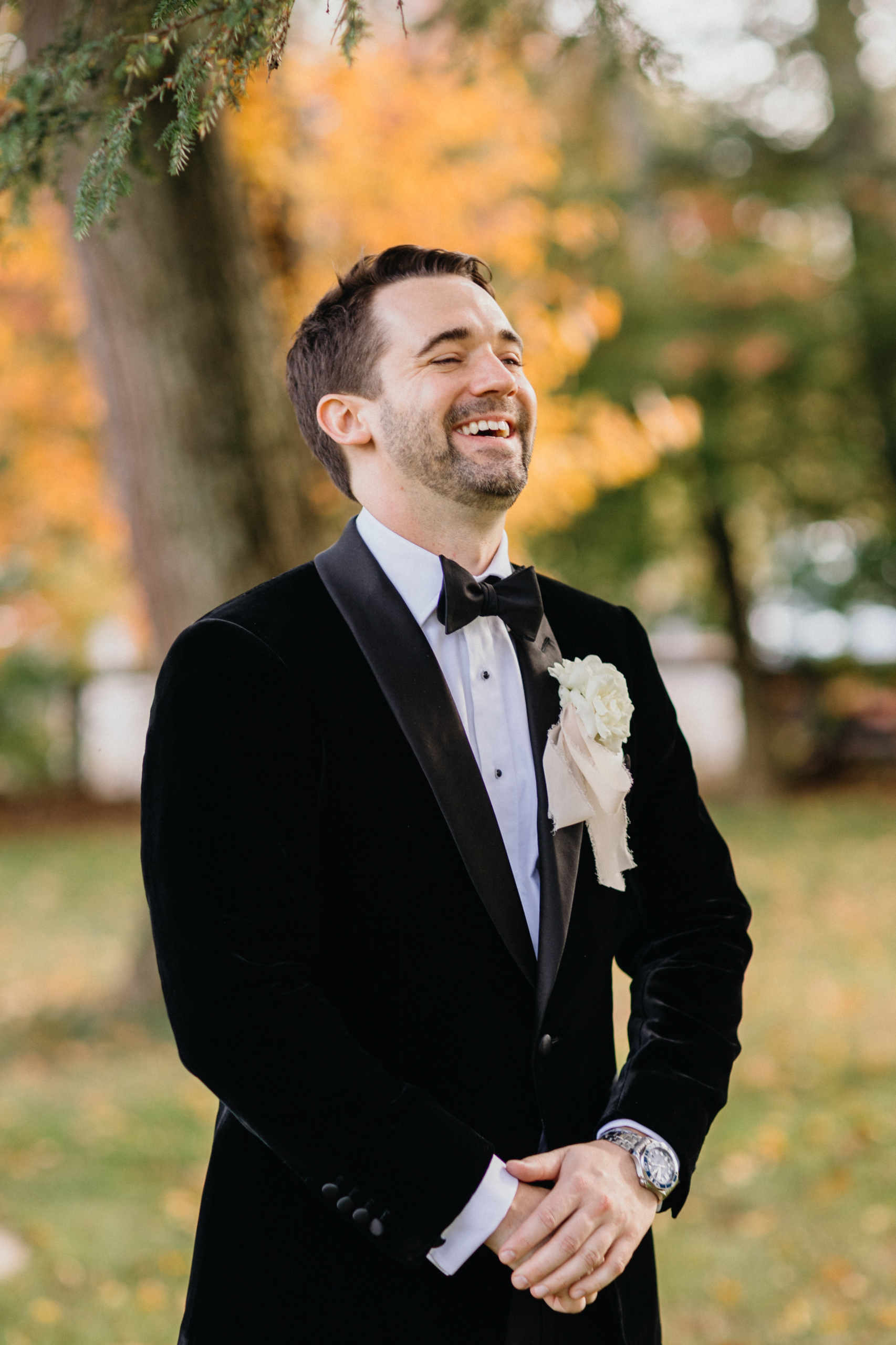 Candid laughter between the couple as they enjoy a peaceful moment captured by Philadelphia wedding photographers.