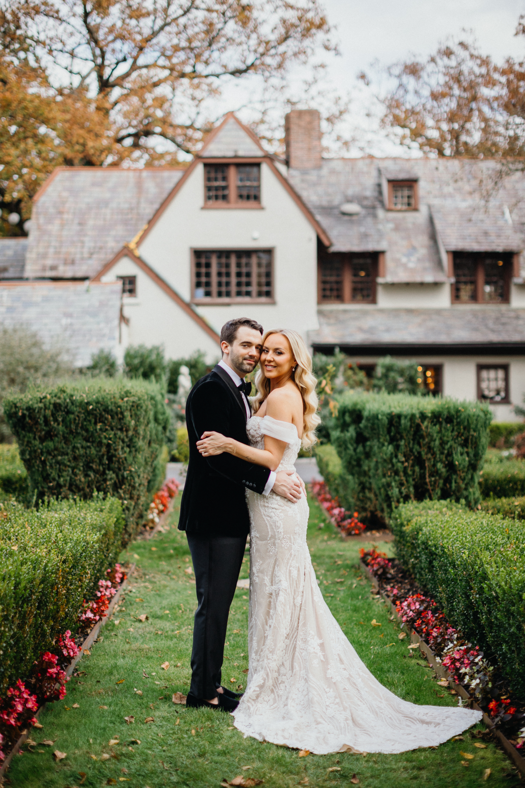 Soft sunlight illuminates the couple’s embrace capturing the romance.