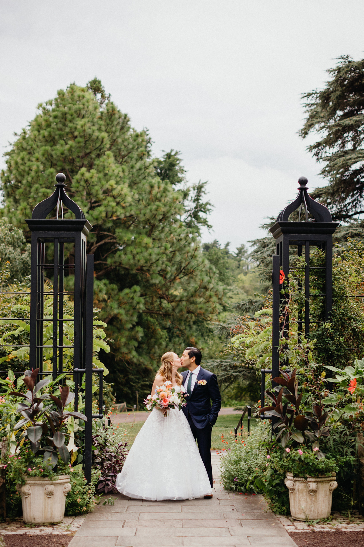 A couple stealing a moment alone at a garden wedding venue in Philadelphia.