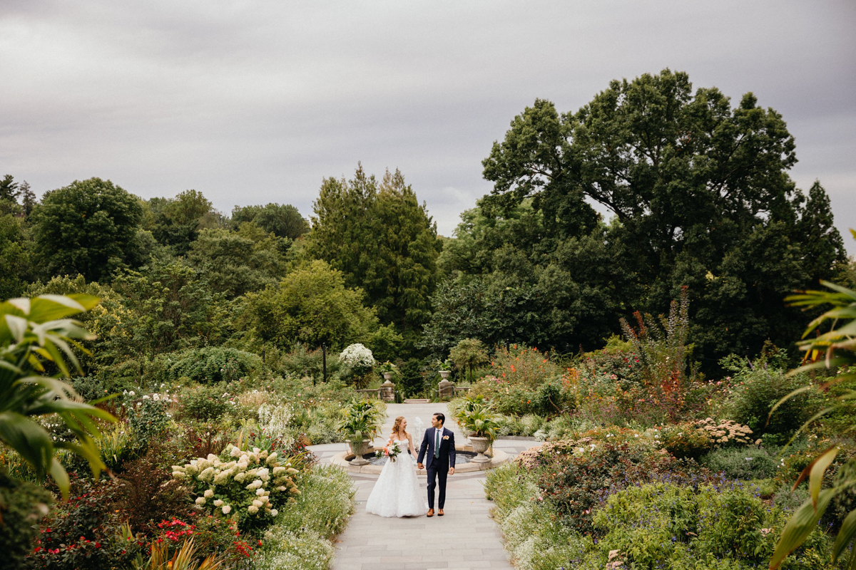 A bride and groom laughing together, captured by a Philly wedding photographer.