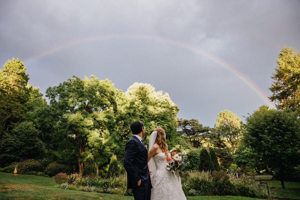 A stunning rainbow over a Morris Arboretum and Gardens wedding.