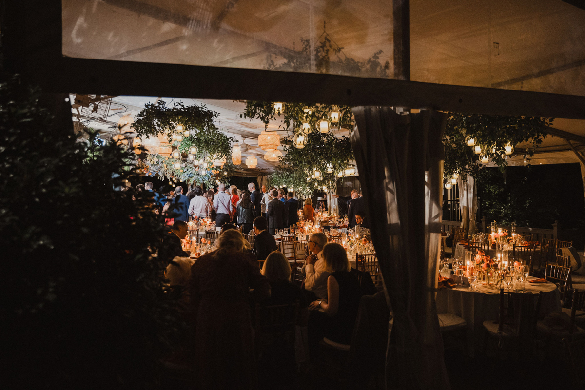 A beautifully lit evening reception at a Morris Arboretum wedding.