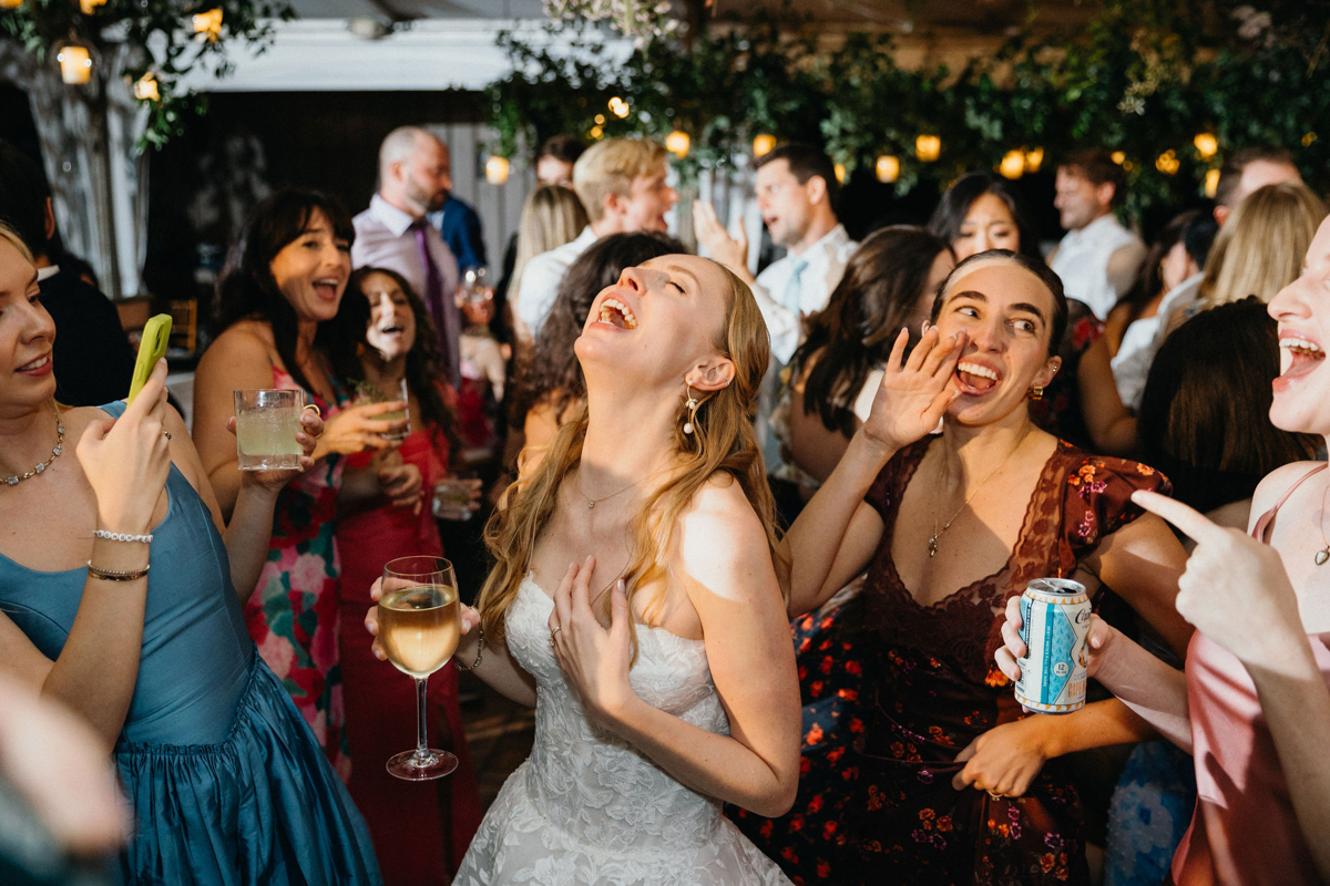 A joyful wedding party at a garden wedding venue in Philadelphia.