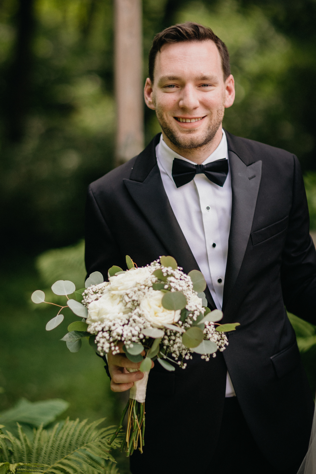 candid portrait of groom before his holly hedge wedding