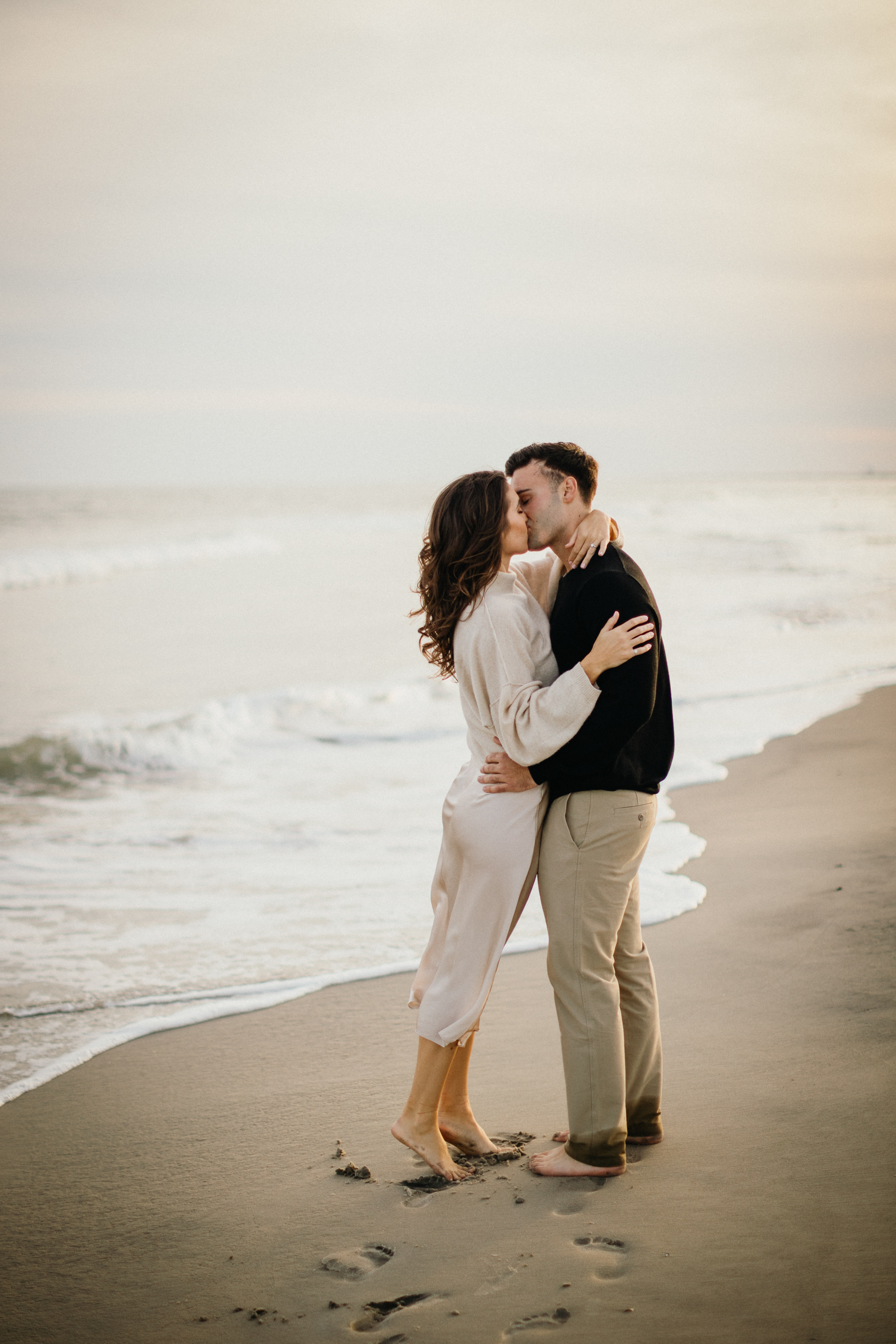 Candid beach engagement session in Ocean City NJ