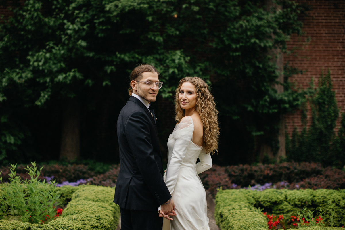 Close-up of the couple framed by soft greenery. – Philadelphia wedding, microwedding venue in Philadelphia.