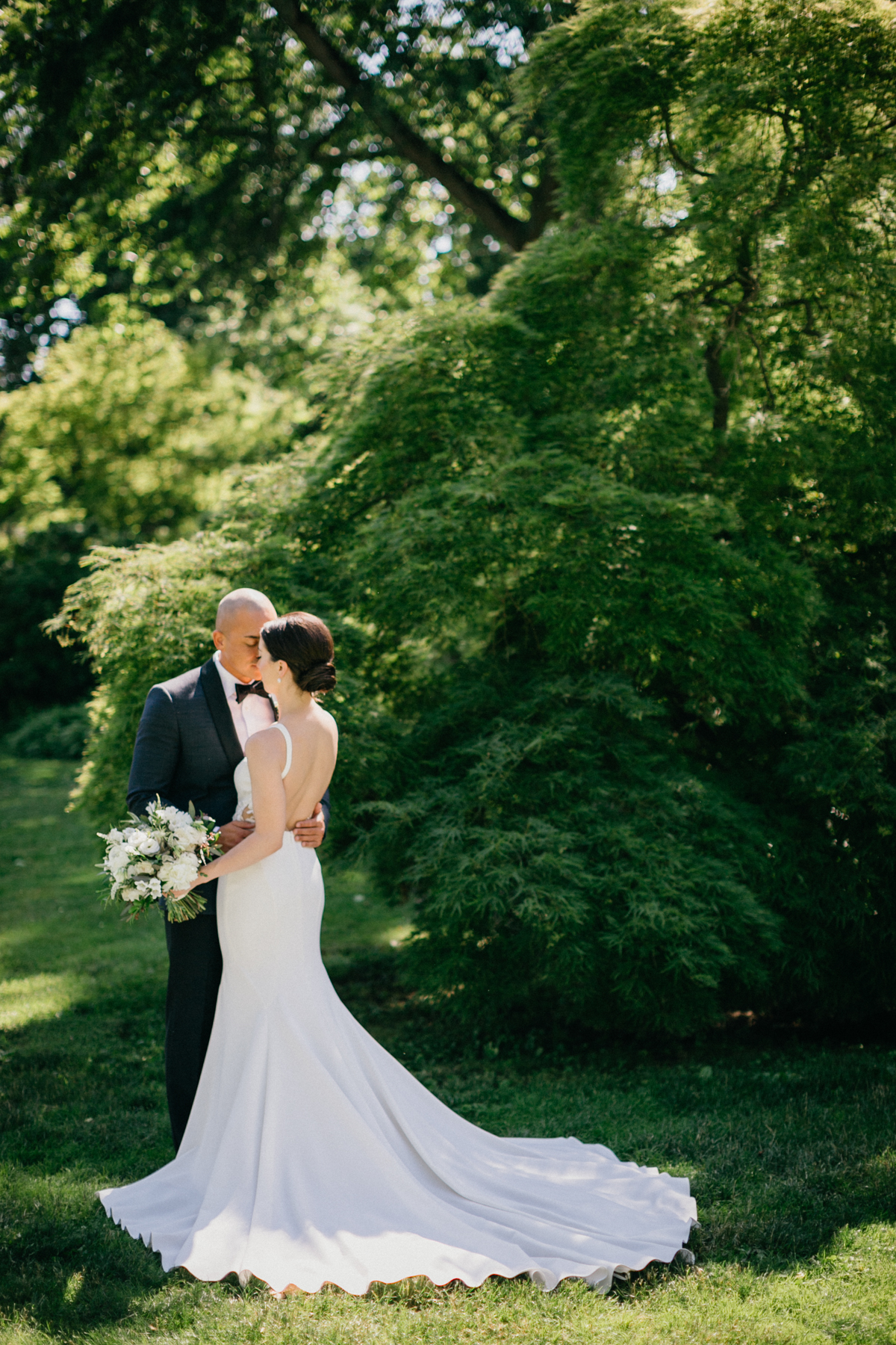 Romantic garden portrait with couple under trees – Glen Foerd on the Delaware