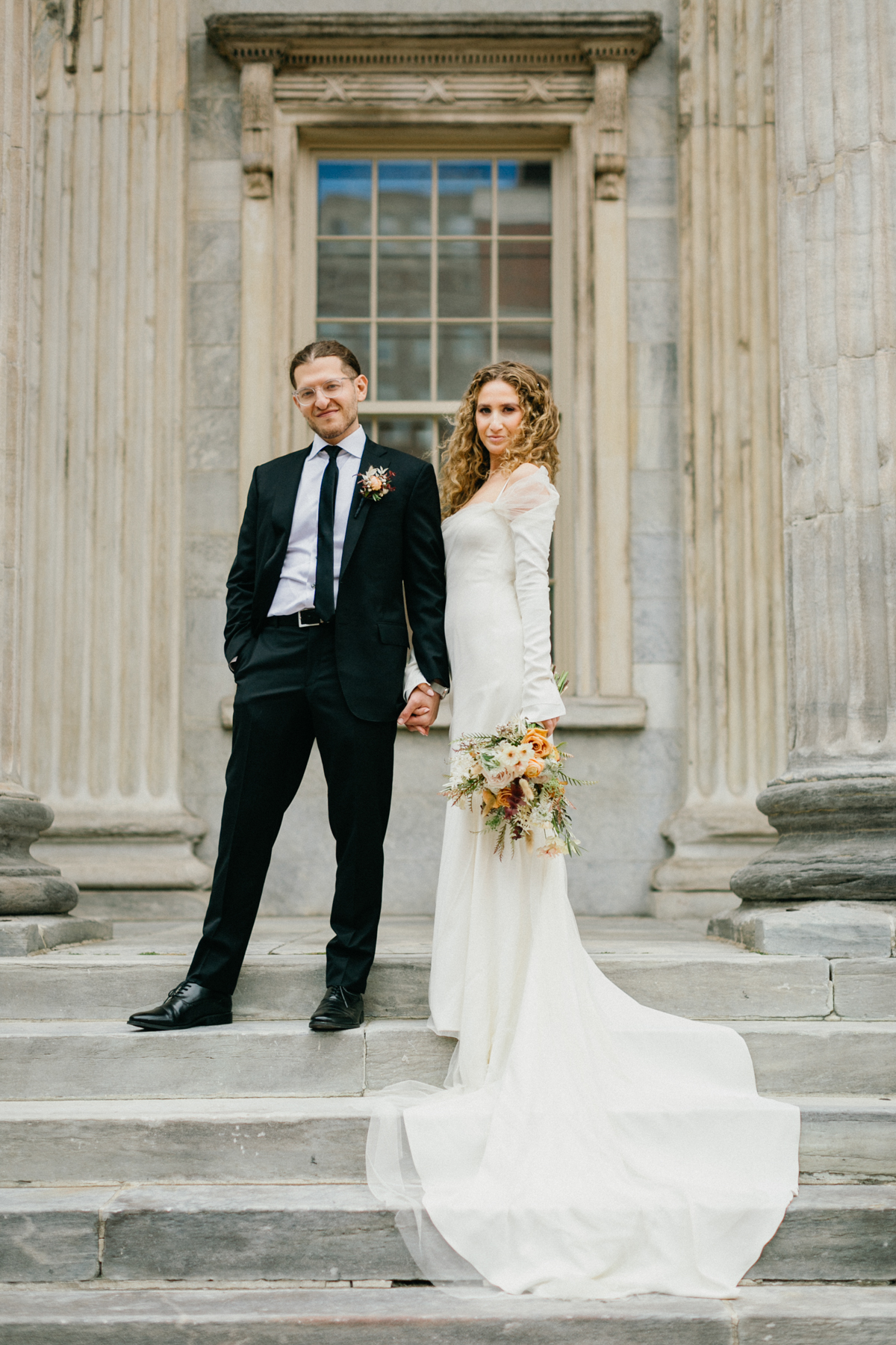 editorial portrait of the couple outside the First Bank – Zahav wedding, Philly wedding
