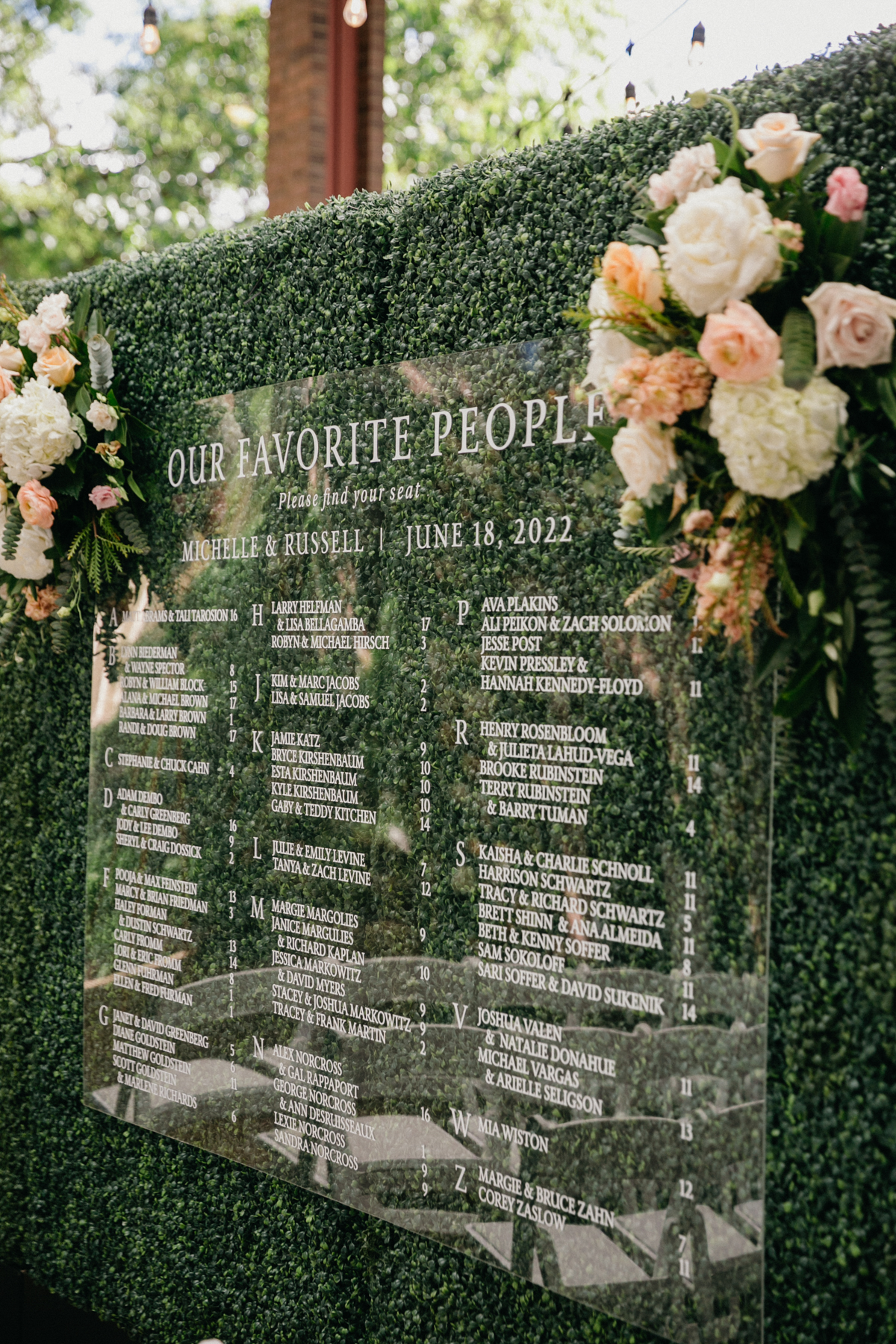Elegant glass seating chart with handwritten names at Zahav – Zahav wedding, Philadelphia wedding photographer