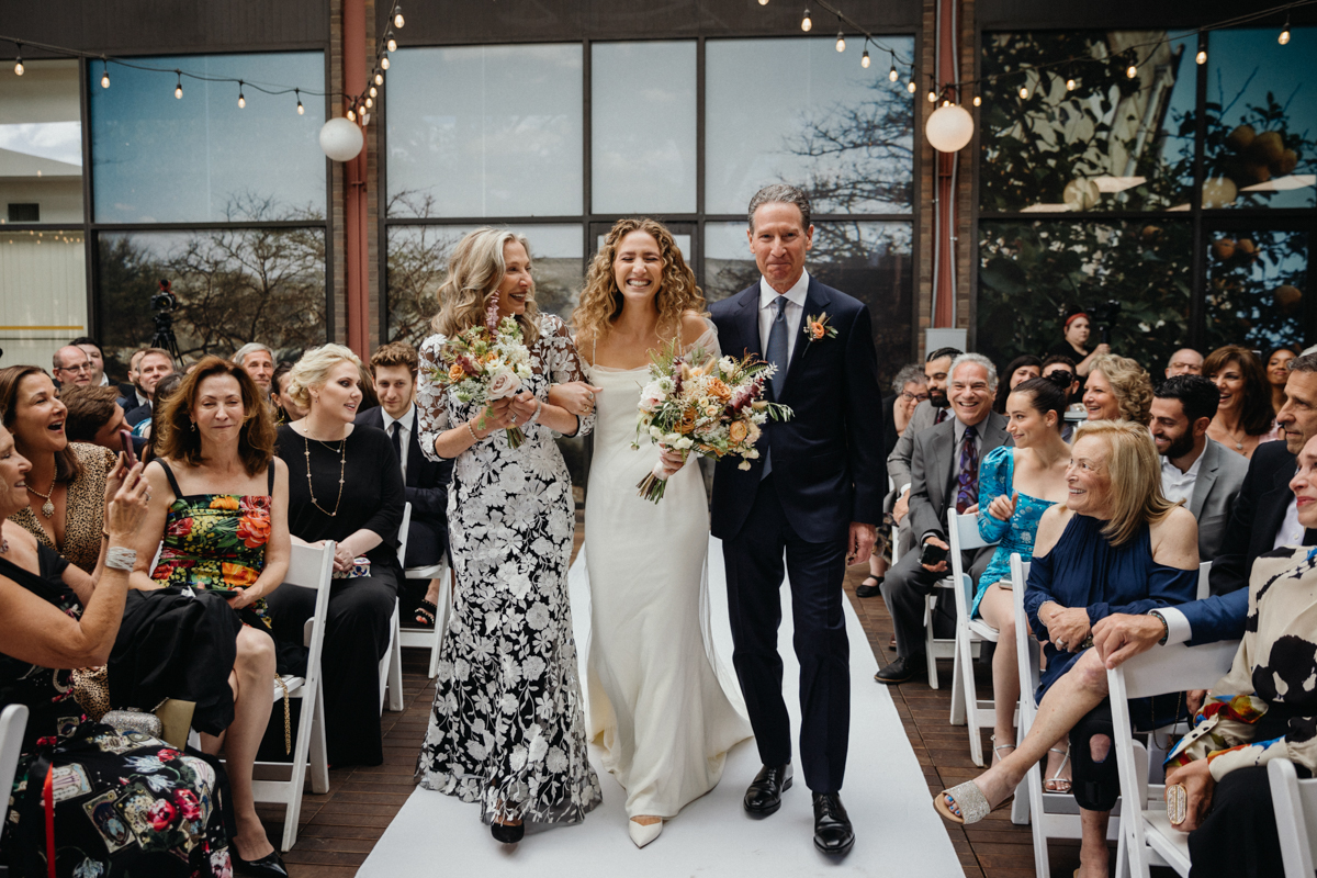 Bride walking down the aisle on Zahav’s patio – Philly wedding, editorial photographer