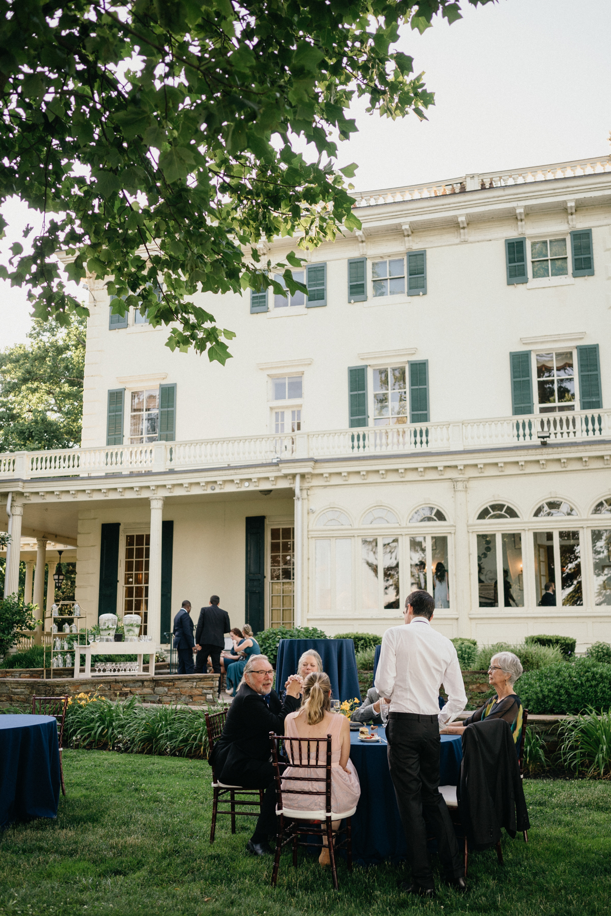 Outdoor cocktail hour by mansion – Pennsylvania wedding photographer