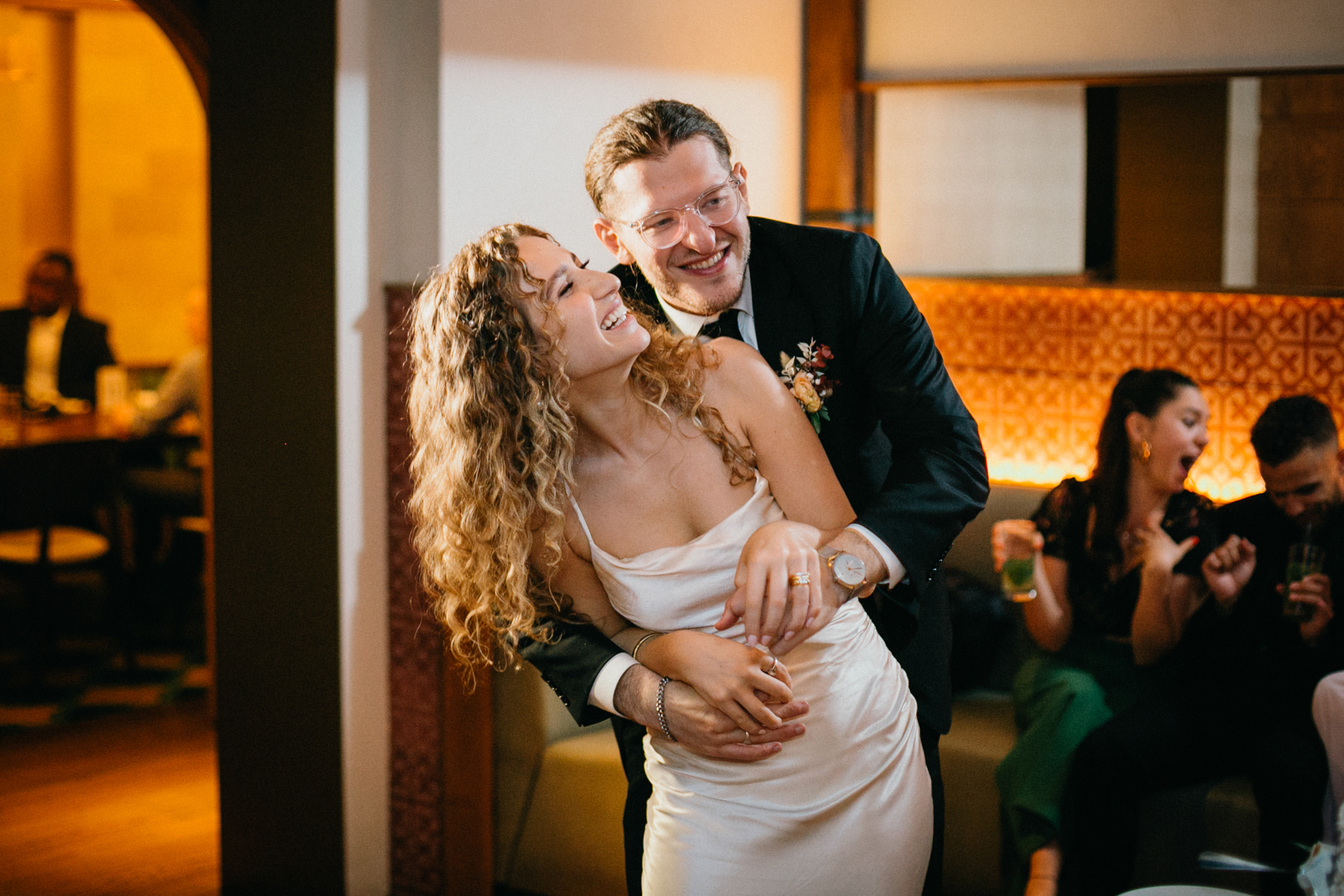 Bride and groom sharing a joyful dance under warm reception lights – Zahav wedding in Philadelphia, Philadelphia wedding photographer