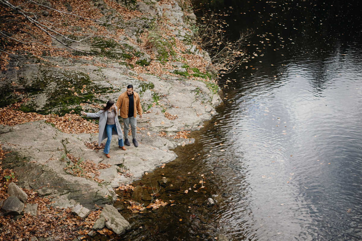 Natural, candid moment in Wissahickon park engagement photos