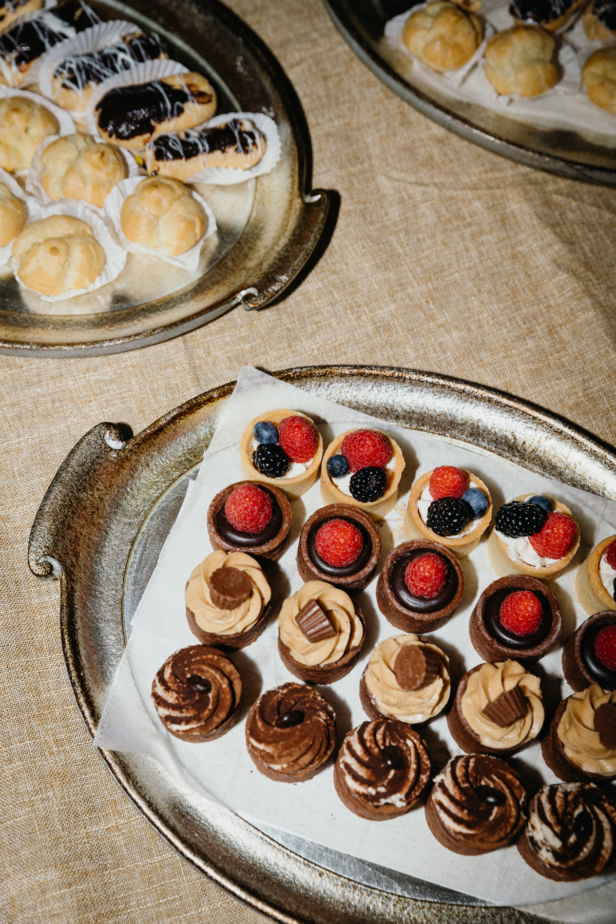 Overhead view of the desserts at the wedding welcome party at Vita's speakeasy