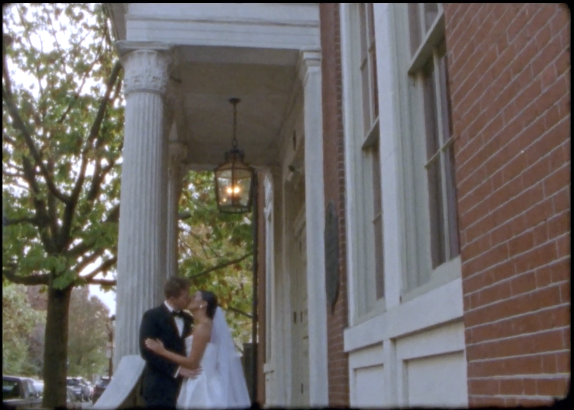 Super 8 wedding videographer filming classic Philly wedding portraits
