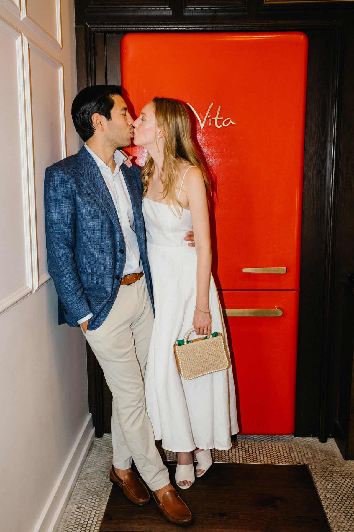 A sweet moment captured by a Philadelphia wedding photographer at More Behind the Door