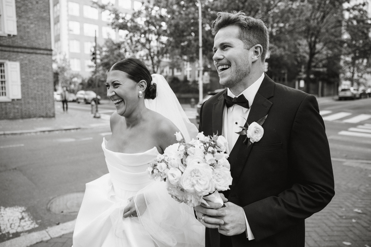Super 8 footage of bride and groom walking through Philly streets