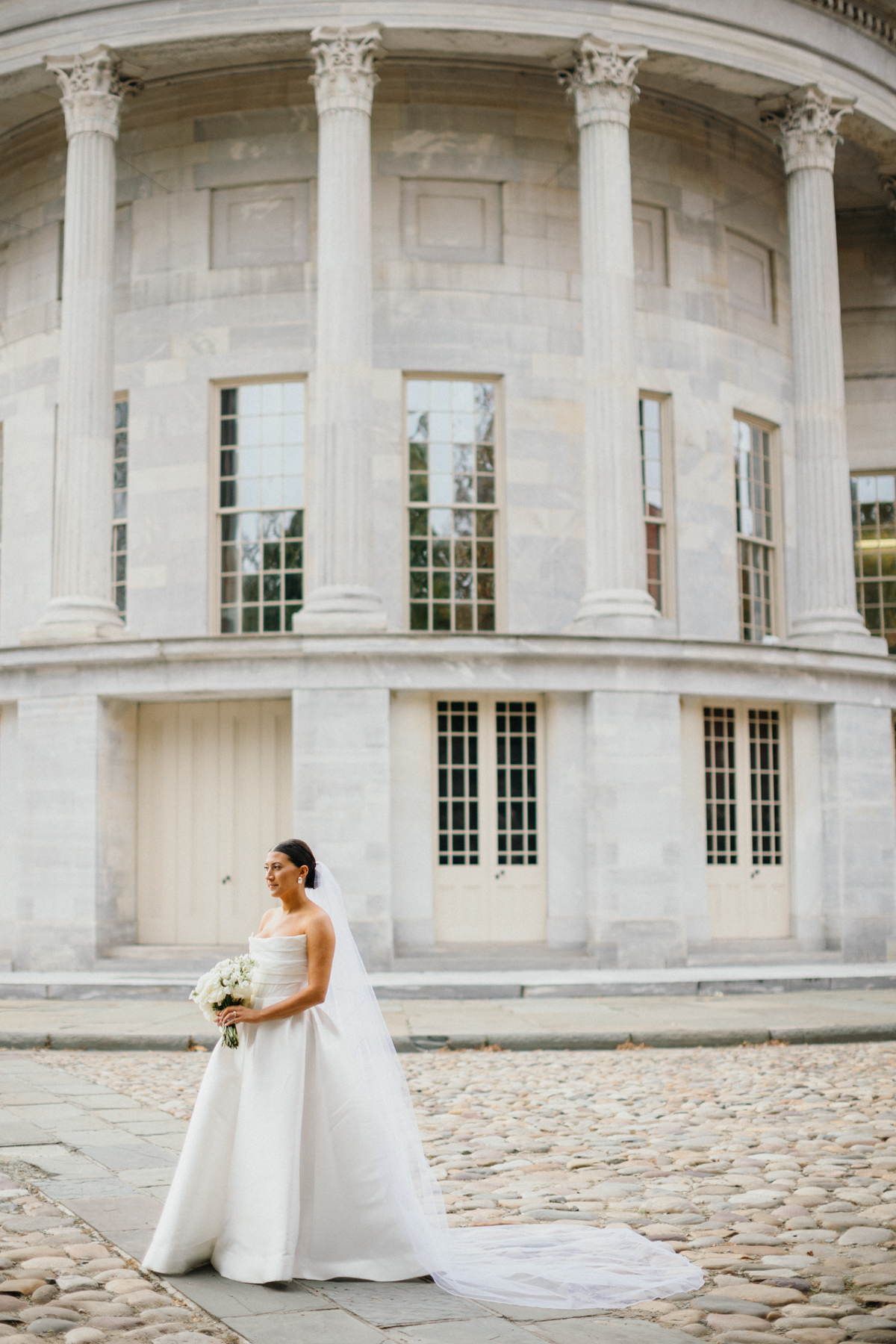 Super 8 wedding videographer filming bridal portraits at Merchants Exchange