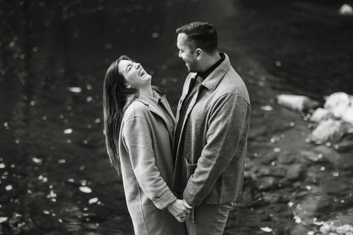 Holding hands during Wissahickon Valley Park engagement photos