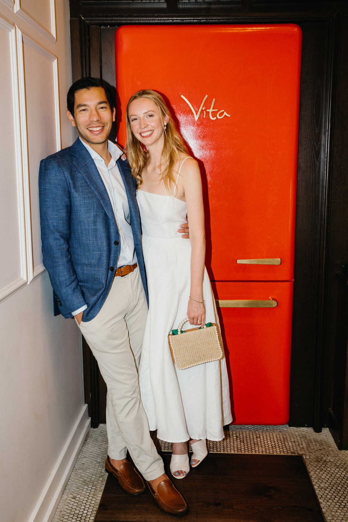 bride and groom portrait at microwedding restaurant venue in philly - more behind the door