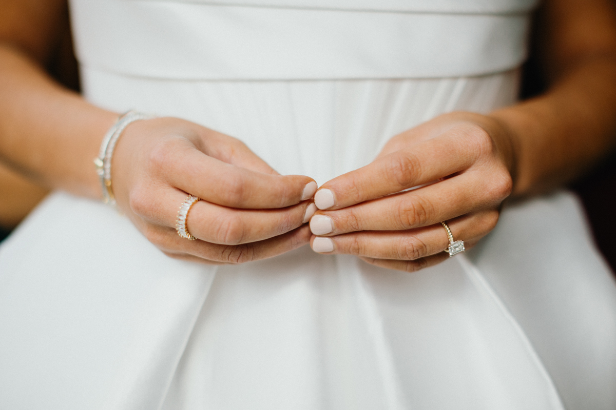 Super 8 wedding videographer capturing close-up of wedding rings