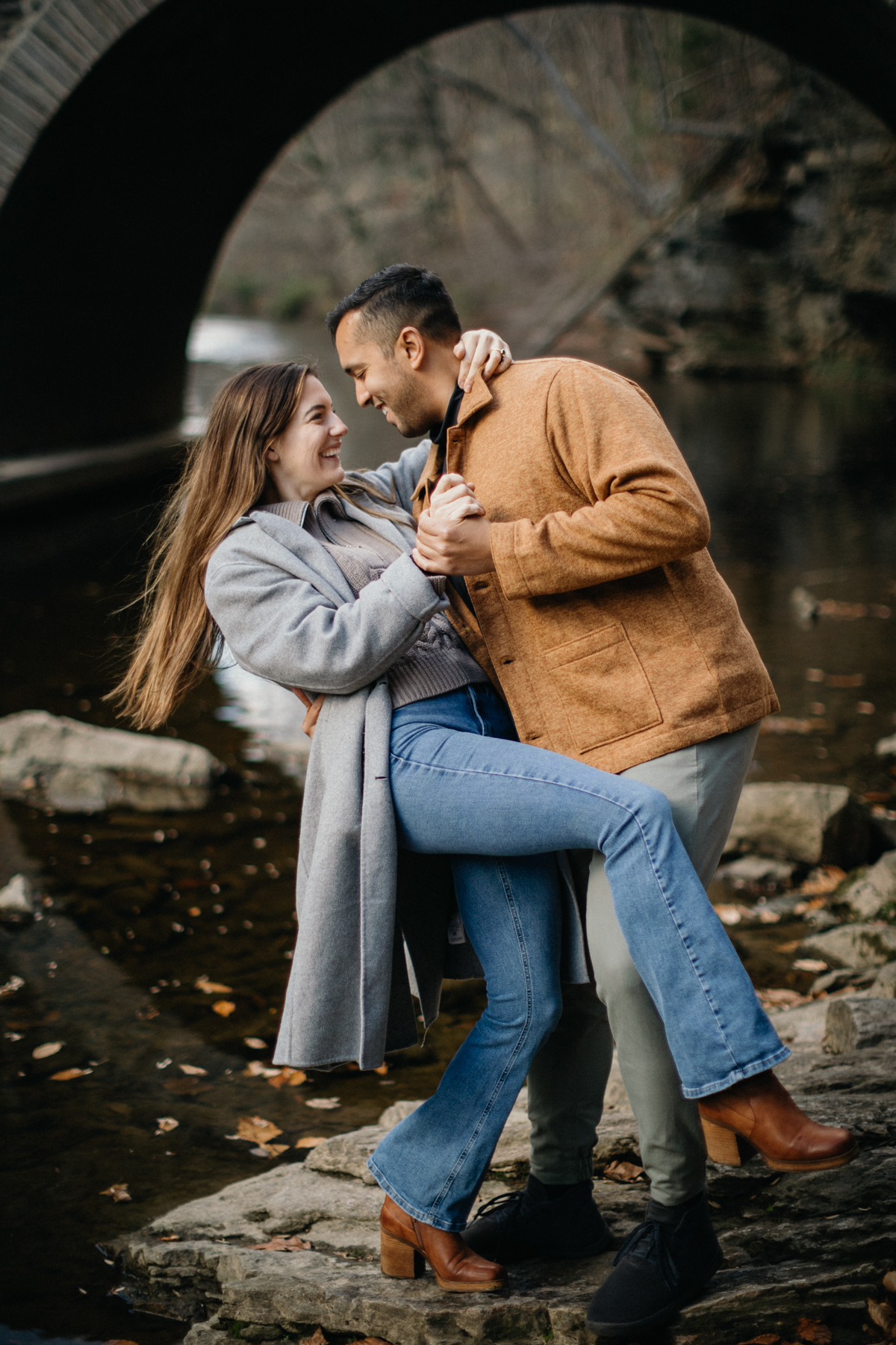 Laughing together during Wissahickon Valley Park engagement session