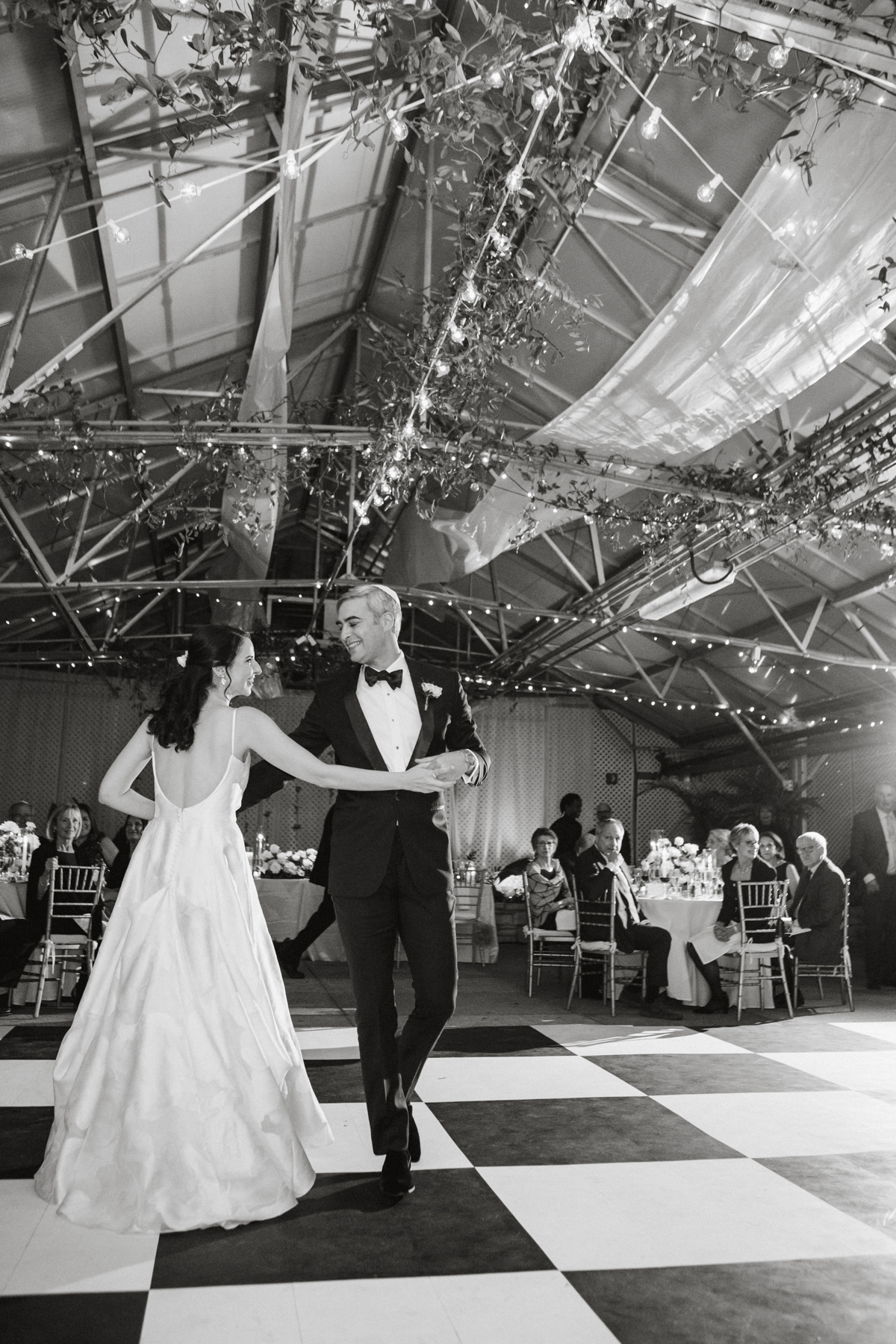 First dance under string lights in the Horticulture Center