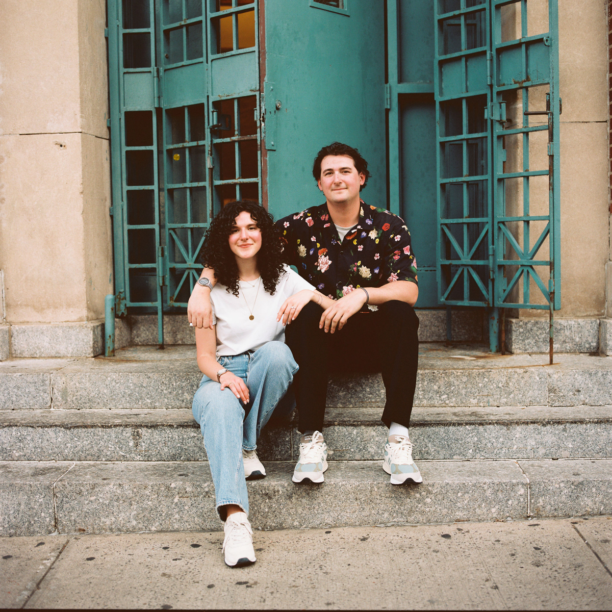 Medium format film photographer capturing the couple’s joy during a Brooklyn engagement session.